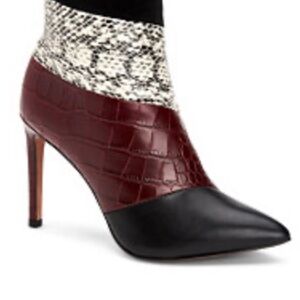 BCBGMaxAzria Black and Brown Snakeskin Heeled Boots